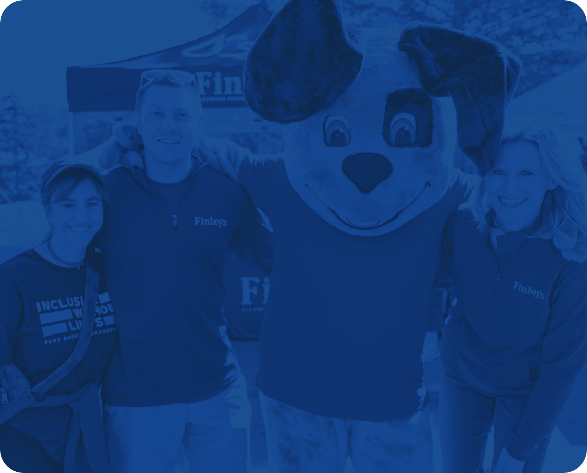 Photo of Finley's Mascot with Group of People with Blue Overlay
